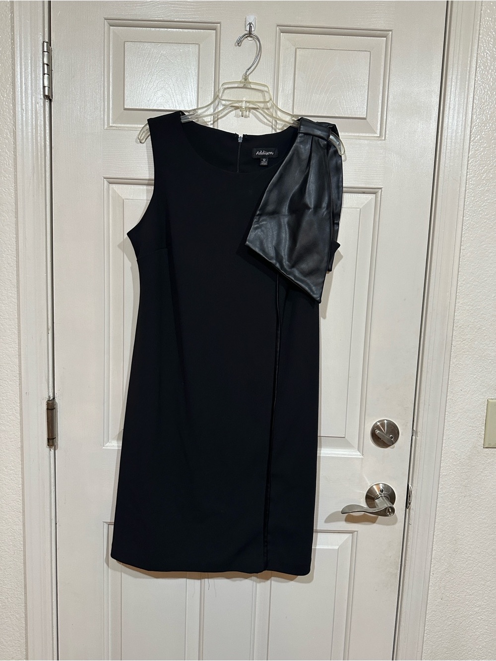 Sleeveless Black Mini Dress with Faux Leather Shoulder Bow